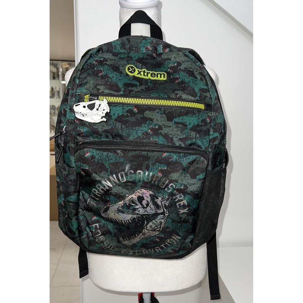 (.. 8)Xtrem by Samsonite Bolt 320 backpack in the "Green Dino" design.